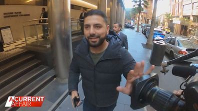 One of Richard Sckaff's supporters made an effort to aggressively block A Current Affair's cameras.