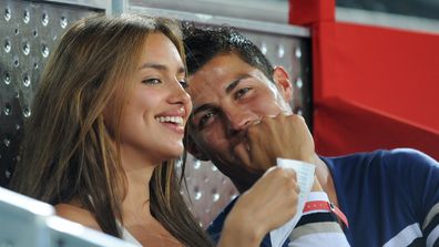 Irina Shayk and Cristiano Ronaldo during a friendly basketball game between Spain and the USA at La Caja Magica on August 22, 2010 in Madrid, Spain. (Photo by Jasper Juinen/Getty Images)
