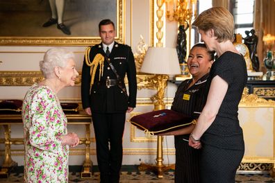 Queen Elizabeth II presents the George Cross to Ms Amanda Pritchard, Chief Executive of NHS England, and Ms May Parsons, Modern Matron at University Hospital Coventry and Warkwickshire, representatives of the National Health Service during an Audience at Windsor Castle on July 12, 2022 in Windsor, England 