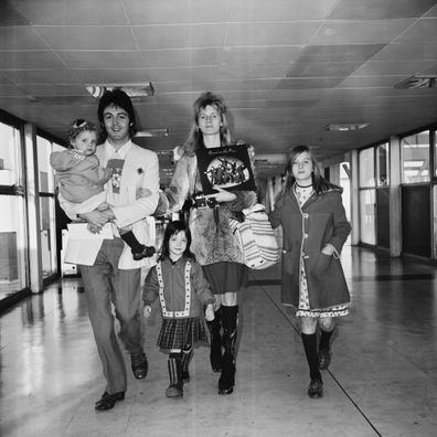 Paul McCartney pictured with his wife Linda and children, from left, Stella, Mary and Heather at Heathrow airport as they prepare to fly to Jamaica in 1973. 