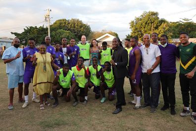 Prince William, Duke of Cambridge and Catherine, Duchess of Cambridge meet winners of Jamaica's famous Manning Cup during a visit to Trench Town, the birthplace of reggae music, on day four of the Platinum Jubilee Royal Tour of the Caribbean on March 22, 2022 in Kingston, Jamaica 