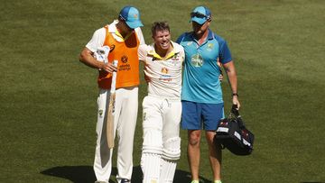David Warner of Australia leaves the field injured after celebrating his double century. (Photo by Daniel Pockett - CA/Cricket Australia via Getty Images)