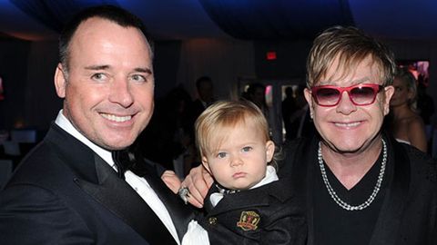 Elton and David with their first child Zachary Jackson Levon