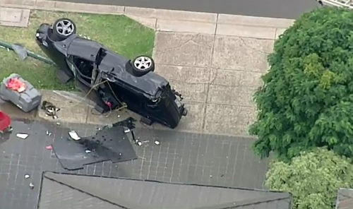 Police uncovered a treasure trove of evidence at the scene of the flipped ute including a machete, large knife, baseball bat and drug paraphernalia. (9NEWS)