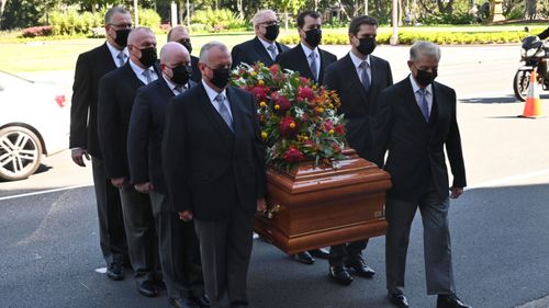 John Fahey's casket being carried into St Mary's Cathedral. 