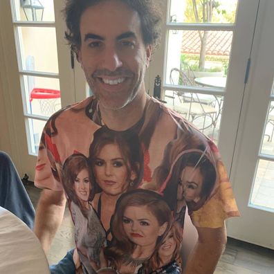 Sacha Baron Cohen wearing a shirt with wife Isla Fisher's face all over it.
