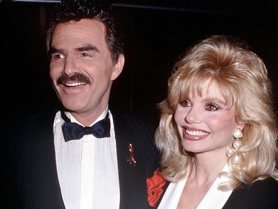 Burt Reynolds with actress Loni Anderson, then husband and wife, circa 1992.