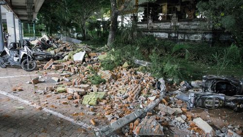 Parts of a shopping mall building collapsed after the earthquake was felt in Denpasar, Bali.