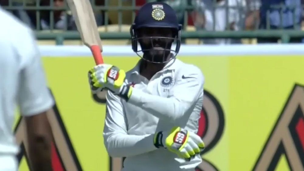 India's Ravindra Jadeja brandishes bat like a sword after posting 50 against Australia