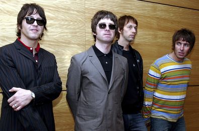 Members of British rock band Oasis  (L-R: Gem Archer, Noel Gallagher, Andy Bell, and Liam Gallagher)