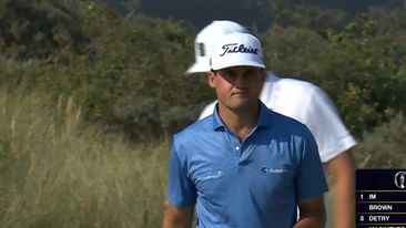 Little known American takes early Open lead