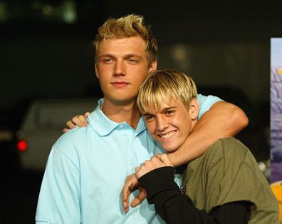 Aaron and Nick Carter (left) aririve for the "Simple Life 2" Welcome Home Party at The Spider Club  on April 14, 2004 in Hollywood. (Photo by Frazer Harrison/Getty Images) *** Local Caption *** Aaron Carter; Nick Carter