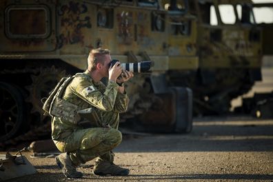 Jake loves his job as a photographer with the Australian Army