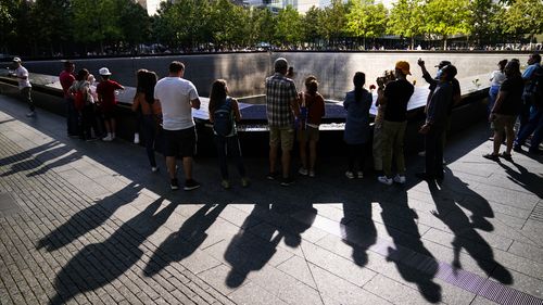 Police officers stand guard at the National September 11 Memorial and Museum 