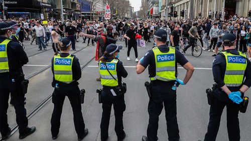 Police in Melbourne during lockdown protests.