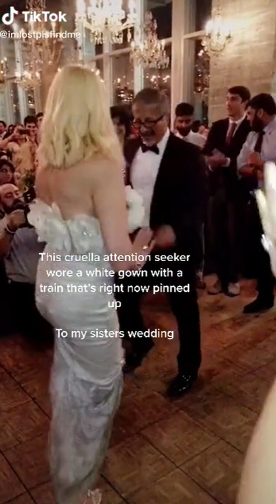 Woman who wore white to wedding slammed as 'attention seeking' in viral clip