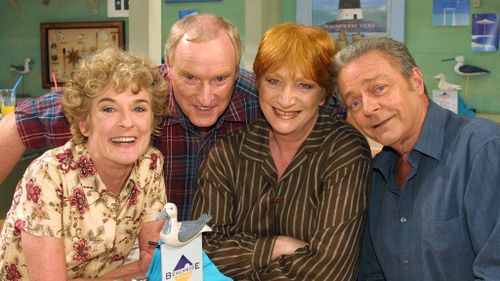 Judy Nunn with Home and Away cast members Ray Meagher, Cornelia Frances and Norman Coburn in 2000. (AAP)