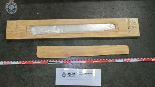 Inside the hollowed out slats of wood were large bags of methamphetamine.