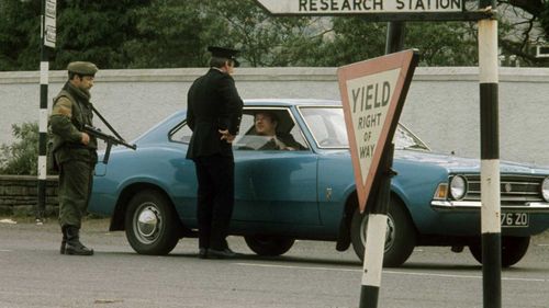 Police and military at a border checkpoint in Ireland in 1974.