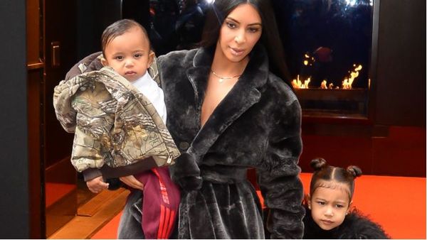 Kimmy K, baby Saint and big sister North. Image: Getty.