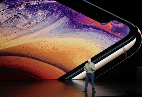 Phil Schiller, senior vice president of worldwide marketing at Apple Inc., speaks at an Apple event at the Steve Jobs Theater at Apple Park