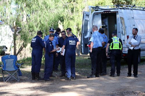 Police forensics investigate the deaths on the rural property. (AAP)