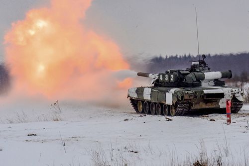 In this photo released by the Russian Defense Ministry Press Service on in Nizhny Novgorod, Russia, Saturday, Feb. 5, 2022,  A tank takes part in a military exercise, in Russia. (Russian Defense Ministry Press Service via AP)