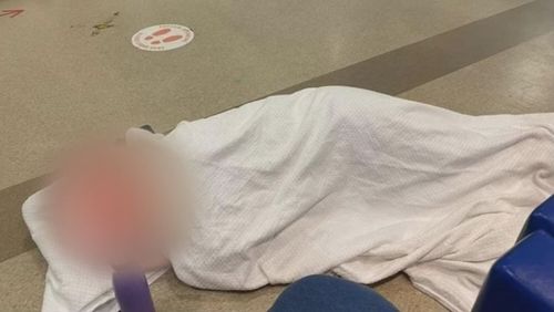An Adelaide family went public with claims their mother was forced to sleep on the emergency department floor with stomach pain for more than five hours on Saturday night.