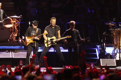 Nils Lofgren and Bruce Springsteen of the E Street Band perform at the Amalie Arena on February 1, 2023 in Tampa, Florida.