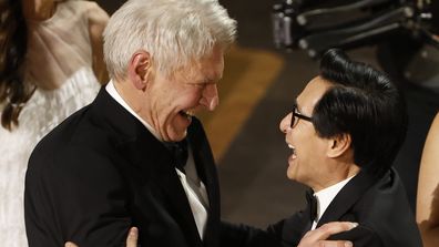 Harrison Ford and Ke Huy Quan embrace at the 95th Oscars Sunday, March 12, 2023,