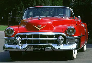 Which line of Cadillacs originated as a limited-production convertible in 1953?