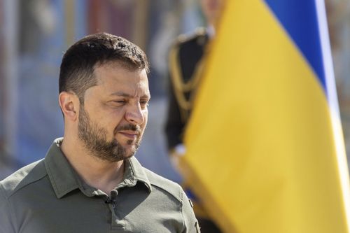 In this photo provided by the Ukrainian Presidential Press Office, Ukrainian President Volodymyr Zelenskyy attends an event for marking Statehood Day in Mykhailivska Square in Kyiv, Friday, July 28, 2023.
