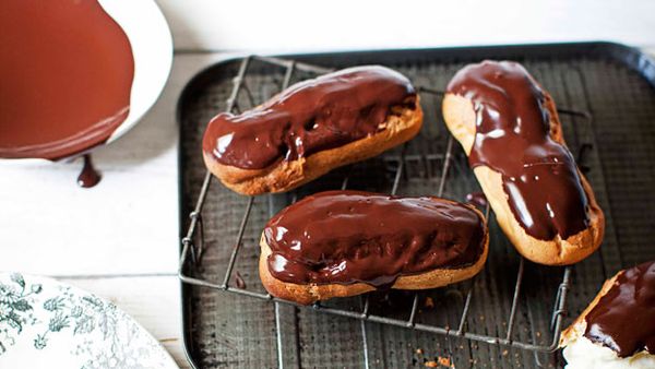 Chocolate eclairs filled with white chocolate cream