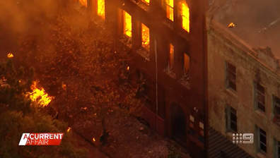 The fire was so intense the front wall of the building collapsed onto the street and crushed a car.