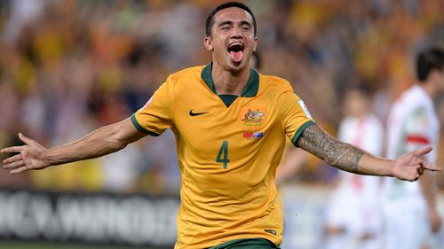 Tim Cahill celebrates one of his two goals against China at the Asian Cup. (Getty)