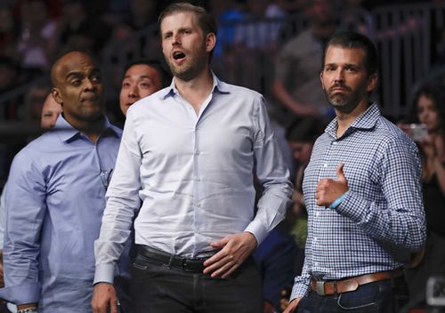 Donald Trump Jr (right) poses for a photo with Eric Trump at UFC Fight Night in Newark, New Jersey.