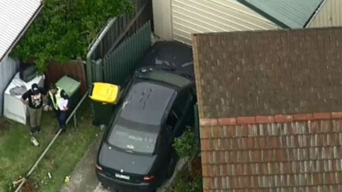 Man suffers spinal injuries and teenager injured after car slams into front yard of Geelong home
