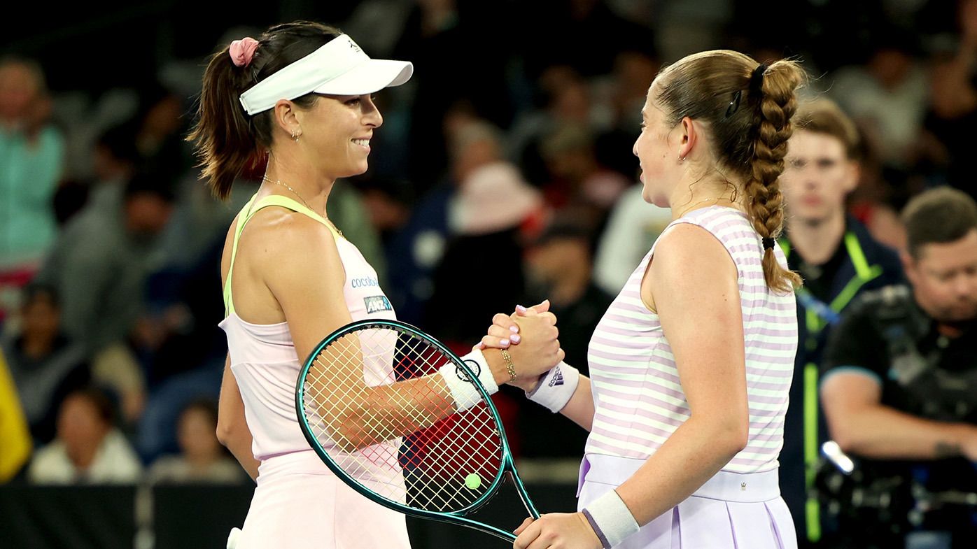Jelena Ostapenko of Latvia (R) embraces Ajla Tomljanovic of Australia after winning her round two singles match during the 2024 Australian Open at Melbourne Park on January 18, 2024 in Melbourne, Australia. (Photo by Phil Walter/Getty Images)