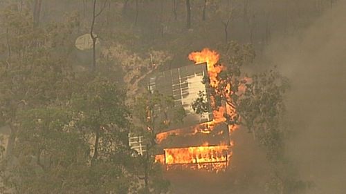 The fire near the Hawkesbury River has damaged property.