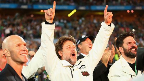 Russell Crowe celebrates the Rabbitohs 2014 NRL Premiership victory. (Getty)