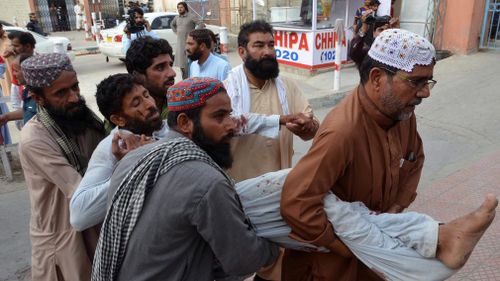 A Pakistani government official says the death toll from a suicide bombing at an election rally in the country's southwest has risen to 128. Picture: EPA