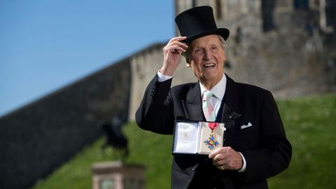 Nicholas Parsons with his Commander of the Order of the British Empire (CBE)  in 2014