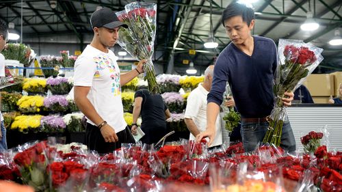 This Valentine's Day, it's a war of the roses when it comes to buying flowers for a loved one (AAP).