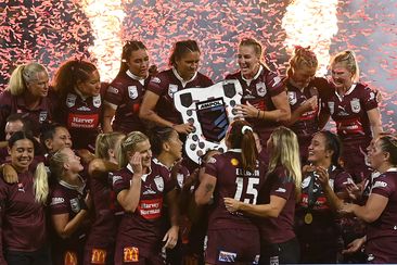 TOWNSVILLE, AUSTRALIA - JUNE 22: Queensland celebrates after winning the series during game two of the women&#x27;s state of origin series between New South Wales Skyblues and Queensland Maroons at Queensland Country Bank Stadium on June 22, 2023 in Townsville, Australia. (Photo by Ian Hitchcock/Getty Images)