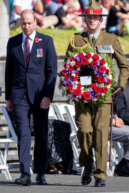 Britain's Prince William, Duke of Cambridge, prepares to lay a wreath during an Anzac Day service at the Auckland War Memorial, in Auckland.