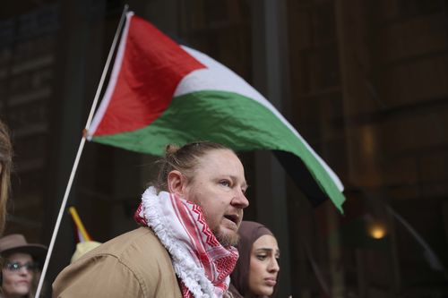 Josh Lees speaks to reporters outside the supreme court after winning the right to march across Sydney Harbour Bridge in support of Palestine tomorrow.