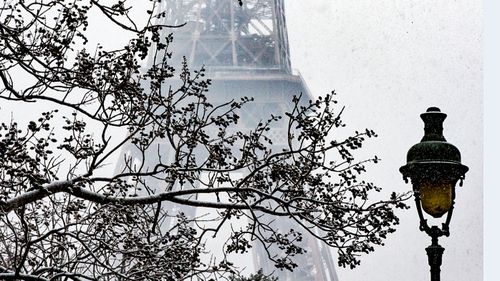 The Eiffel Tower covered in snow. (Photo: AP).