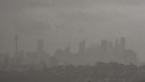 SMH News Sydney. Sydney Weather. Photo shows, Rain rolls across the Sydney basin. Photo Peter Rae. Tuesday 5 Oc