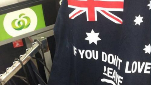 Singlets bearing the slogan "if you don't love it, leave" were quickly pulled from Woolworths shelves. (Supplied)