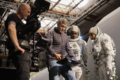 Director George Clooney, David Oyelowo and Tiffany Boone on the set of Netflix movie The Midnight Sky. 